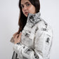 GRAPHIC HEADLINE PUFFER JACKET